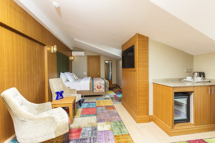 Imagen de la habitación del Hotel Obelisk and Suites. Foto 14