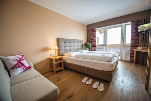 Imagen de la habitación del Hotel Obereggen. Foto 9