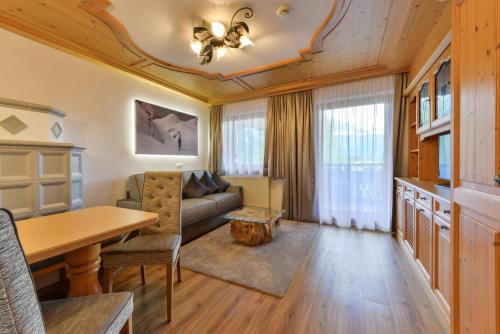Imagen de la habitación del Hotel Oberlechtaler Hof Boutique. Foto 11