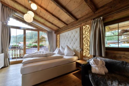 Imagen de la habitación del Hotel Oberlechtaler Hof Boutique. Foto 17