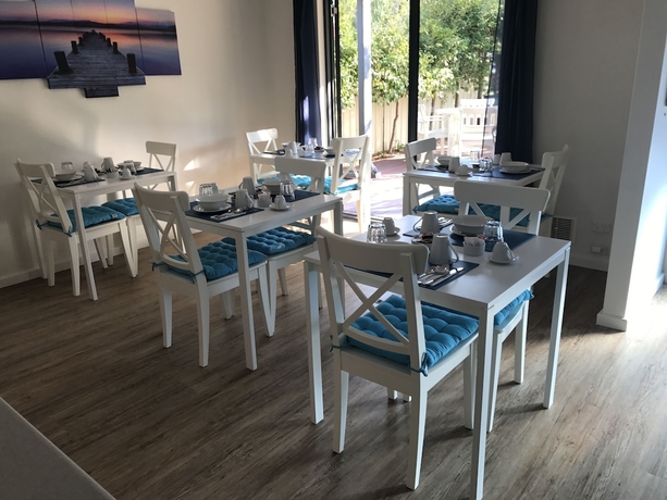 Imagen del bar/restaurante del Hotel Observatory Guesthouse - Adults Only. Foto 3