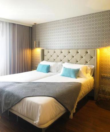 Imagen de la habitación del Hotel Oca Oriental Porto. Foto 14