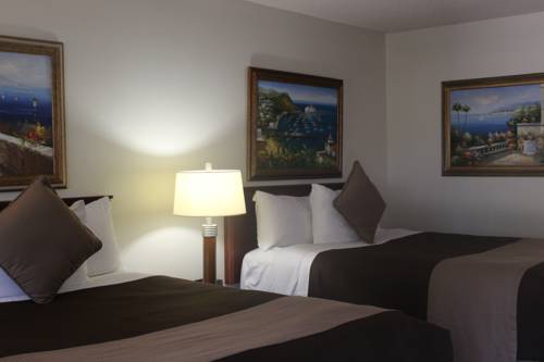 Imagen de la habitación del Hotel O'cairns Inn and Suites. Foto 9