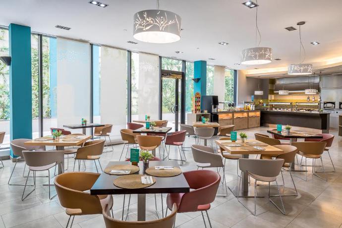 Imagen del bar/restaurante del Hotel Occidental Murcia Agalia. Foto 4