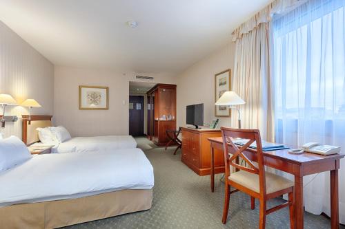 Imagen de la habitación del Hotel Occidental Paris Levallois. Foto 11