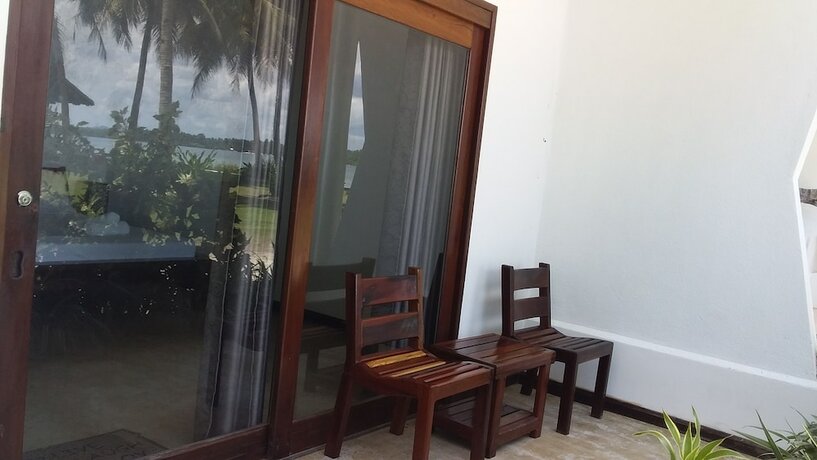 Imagen de la habitación del Hotel Ocean 101 Beach Resort. Foto 20