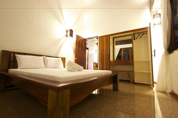 Imagen de la habitación del Hotel Ocean 101 Beach Resort. Foto 22