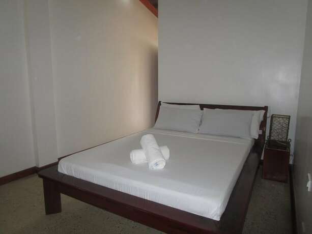 Imagen de la habitación del Hotel Ocean 101 Beach Resort. Foto 30