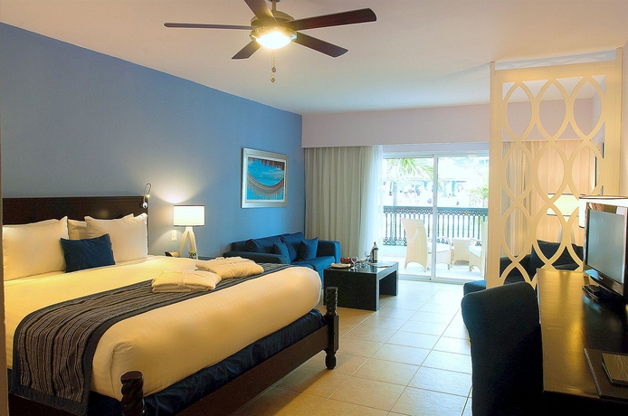 Imagen de la habitación del Hotel Ocean Blue And Sand Beach Resort. Foto 7