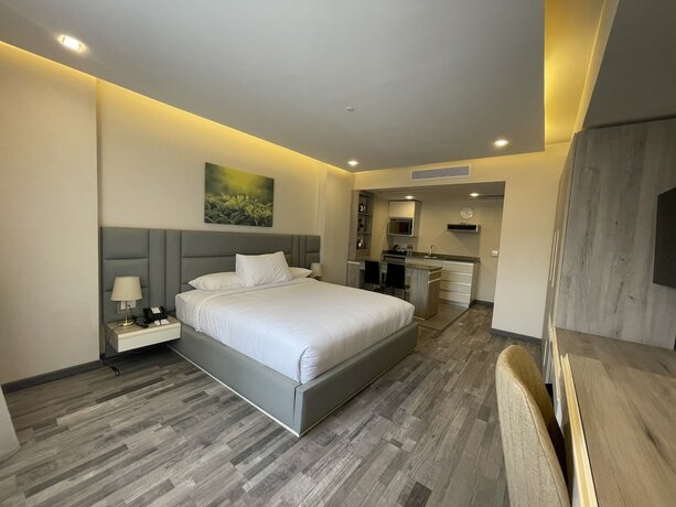 Imagen de la habitación del Hotel Ocean Blue Studios. Foto 16