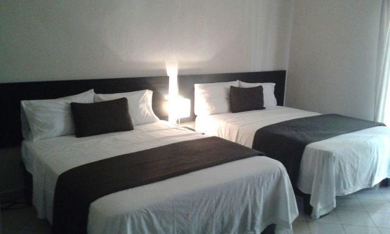 Imagen de la habitación del Hotel Ocean Breeze. Foto 7