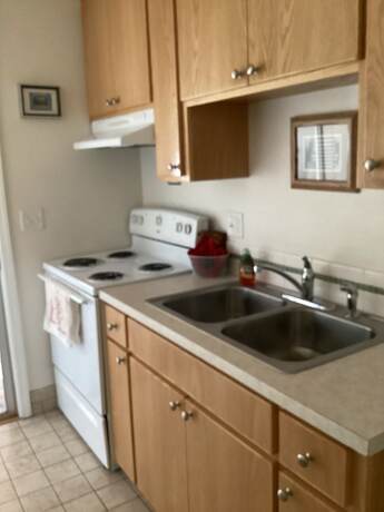 Imagen de la habitación del Hotel Ocean Breeze Motel. Foto 11