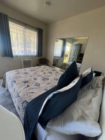 Imagen de la habitación del Hotel Ocean Cove Lodge. Foto 12