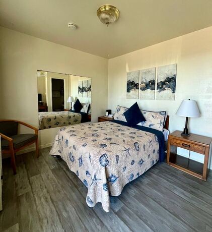 Imagen de la habitación del Hotel Ocean Cove Lodge. Foto 13