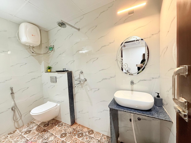 Imagen de la habitación del Hotel Ocean Grand, Varanasi. Foto 8