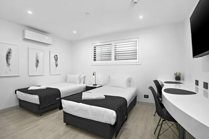 Imagen de la habitación del Hotel Ocean Grove Chalet. Foto 10