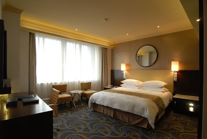 Imagen de la habitación del Hotel Ocean, Guangzhou. Foto 7