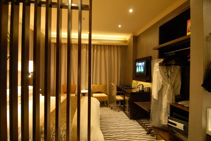 Imagen de la habitación del Hotel Ocean, Guangzhou. Foto 9