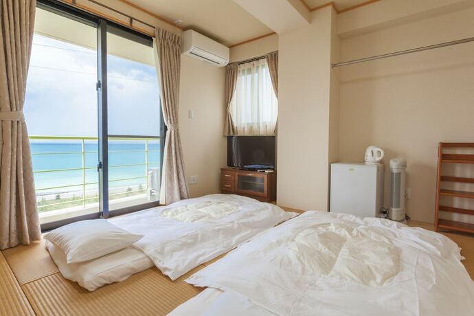 Imagen de la habitación del Hotel Ocean Hills Chouraku Stay. Foto 18