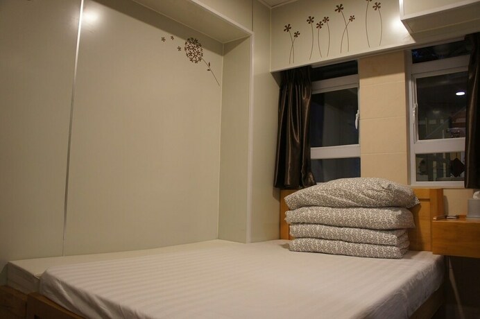 Imagen de la habitación del Hotel Ocean Inn, Kowloon. Foto 24