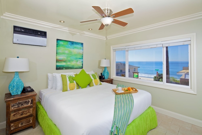 Imagen de la habitación del Hotel Ocean Palms Beach Resort. Foto 16