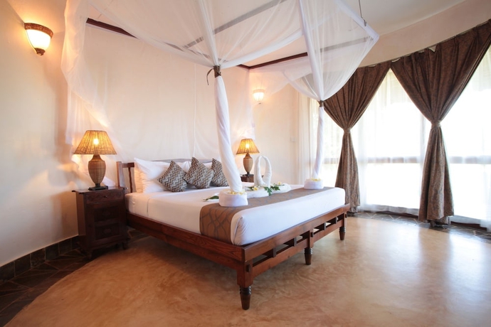 Imagen de la habitación del Hotel Ocean Paradise Resort and Spa Zanzibar. Foto 4