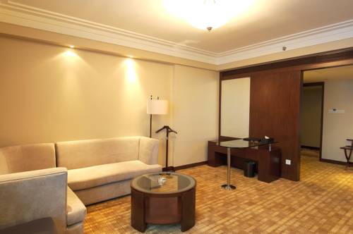 Imagen de la habitación del Hotel Ocean Shanghai. Foto 14