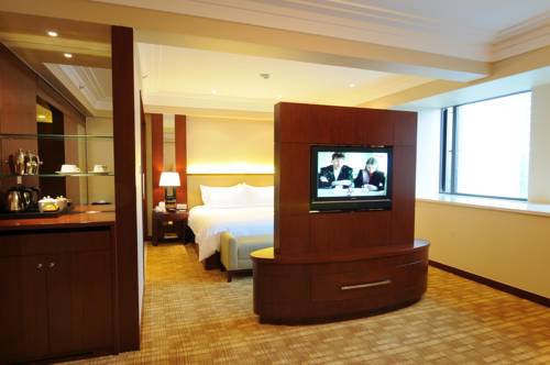 Imagen de la habitación del Hotel Ocean Shanghai. Foto 15