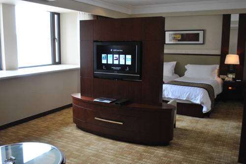 Imagen de la habitación del Hotel Ocean Shanghai. Foto 17