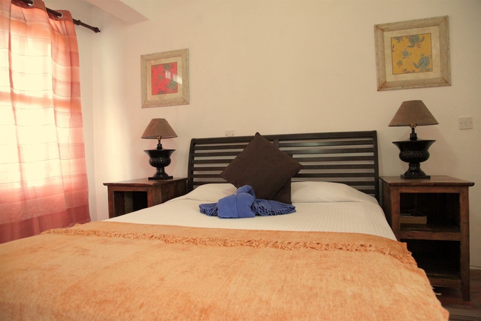 Imagen de la habitación del Hotel Ocean Spray Apartments. Foto 10