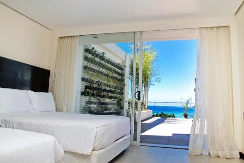 Imagen de la habitación del Hotel Ocean Suites Bohol Boutique. Foto 9