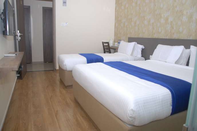 Imagen de la habitación del Hotel Ocean Suites, Mumbai. Foto 3