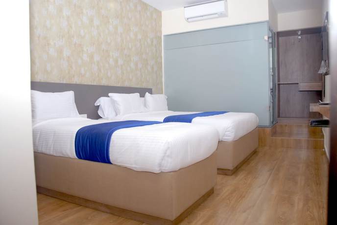 Imagen de la habitación del Hotel Ocean Suites, Mumbai. Foto 13