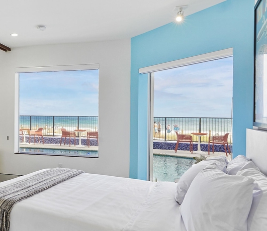 Imagen de la habitación del Hotel Ocean Treasure Beachside Suites. Foto 8