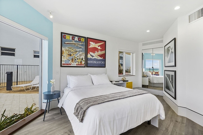 Imagen de la habitación del Hotel Ocean Treasure Beachside Suites. Foto 9