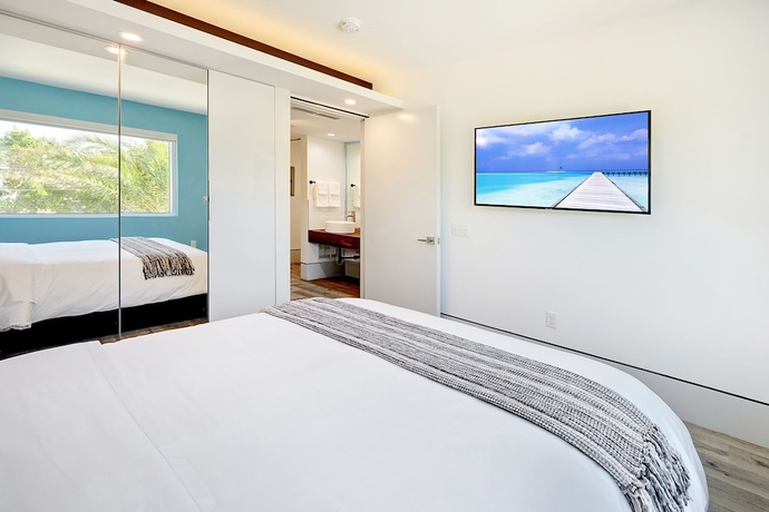 Imagen de la habitación del Hotel Ocean Treasure Beachside Suites. Foto 11