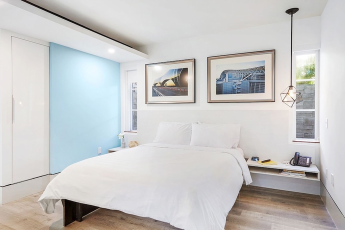 Imagen de la habitación del Hotel Ocean Treasure Beachside Suites. Foto 13