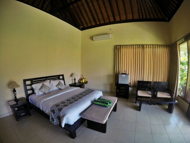 Imagen de la habitación del Hotel Ocean View Tulamben Dive and Resort. Foto 13