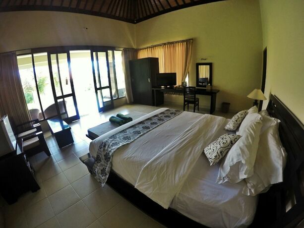Imagen de la habitación del Hotel Ocean View Tulamben Dive and Resort. Foto 15