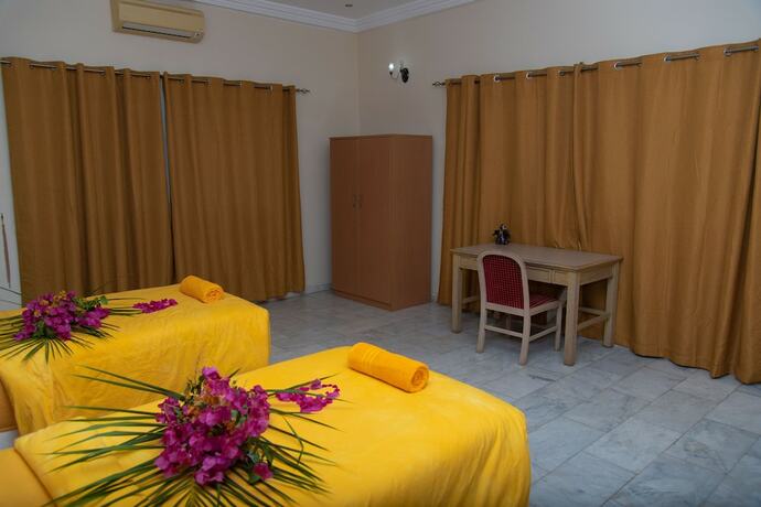 Imagen de la habitación del Hotel Ocean Villa Heights. Foto 11