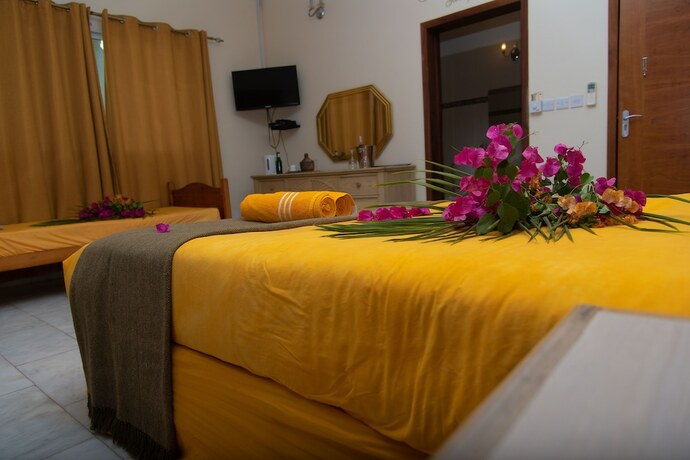 Imagen de la habitación del Hotel Ocean Villa Heights. Foto 12