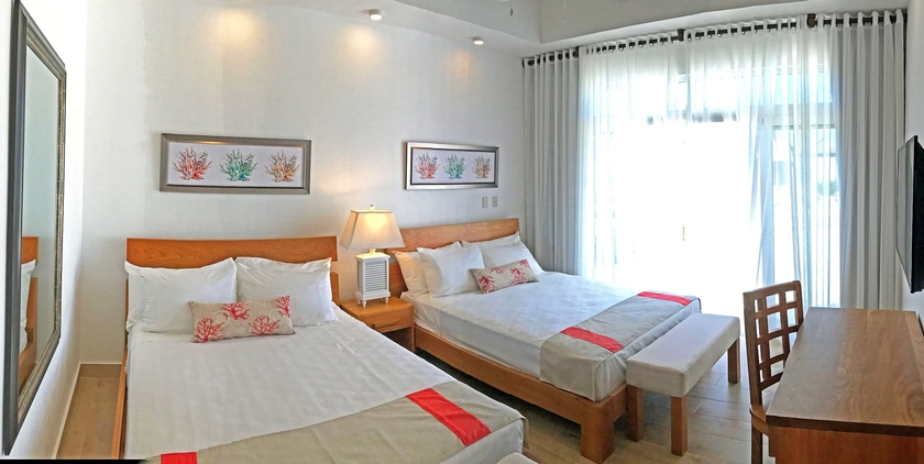 Imagen de la habitación del Hotel Ocean Village Deluxe. Foto 6
