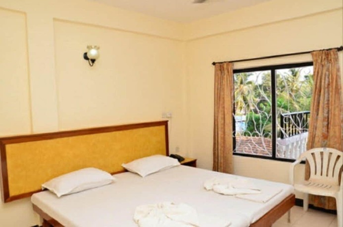 Imagen de la habitación del Hotel Ocean Waves Meera. Foto 14