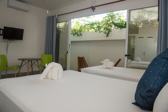 Imagen de la habitación del Hotel Ocean Zen Suites on 5th Avenue - Adults Only. Foto 12