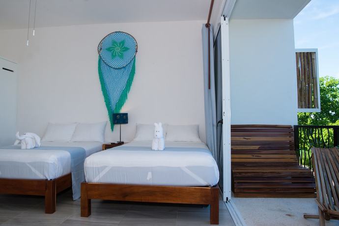 Imagen de la habitación del Hotel Ocean Zen Suites on 5th Avenue - Adults Only. Foto 14