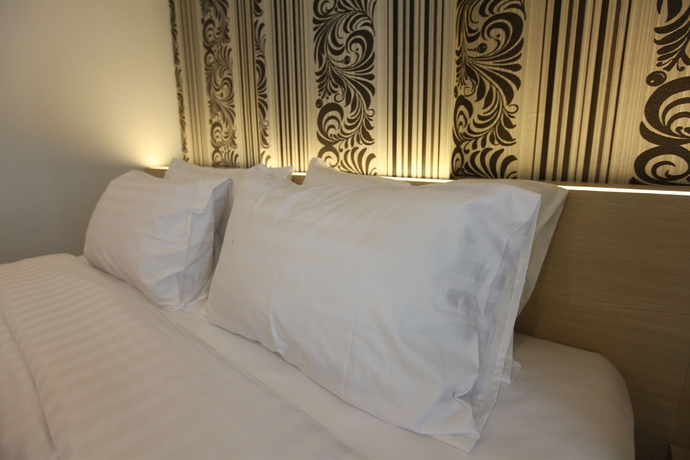 Imagen de la habitación del Hotel Ocean and Ole Patong. Foto 11