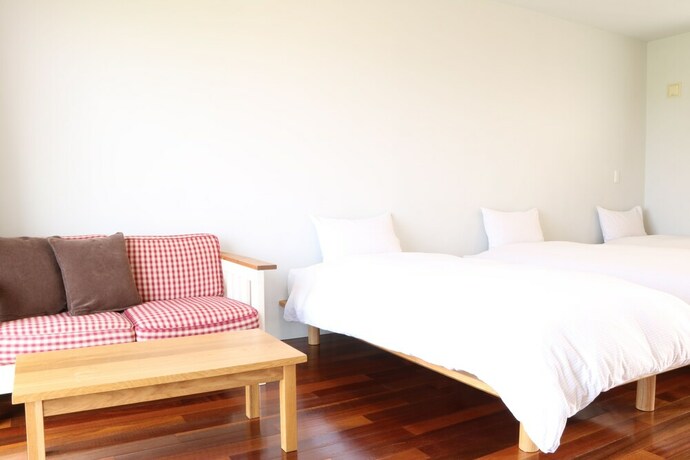 Imagen de la habitación del Hotel OceanVilla Yuninohama. Foto 24