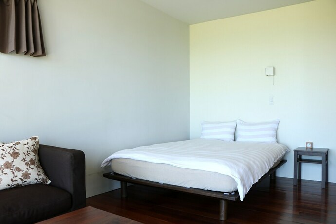 Imagen de la habitación del Hotel OceanVilla Yuninohama. Foto 27