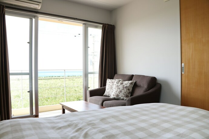 Imagen de la habitación del Hotel OceanVilla Yuninohama. Foto 29