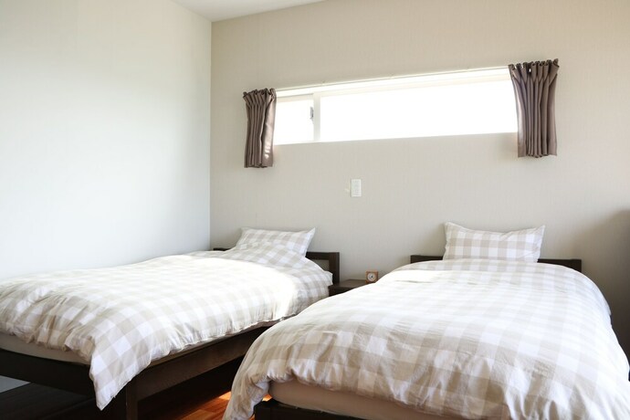 Imagen de la habitación del Hotel OceanVilla Yuninohama. Foto 34